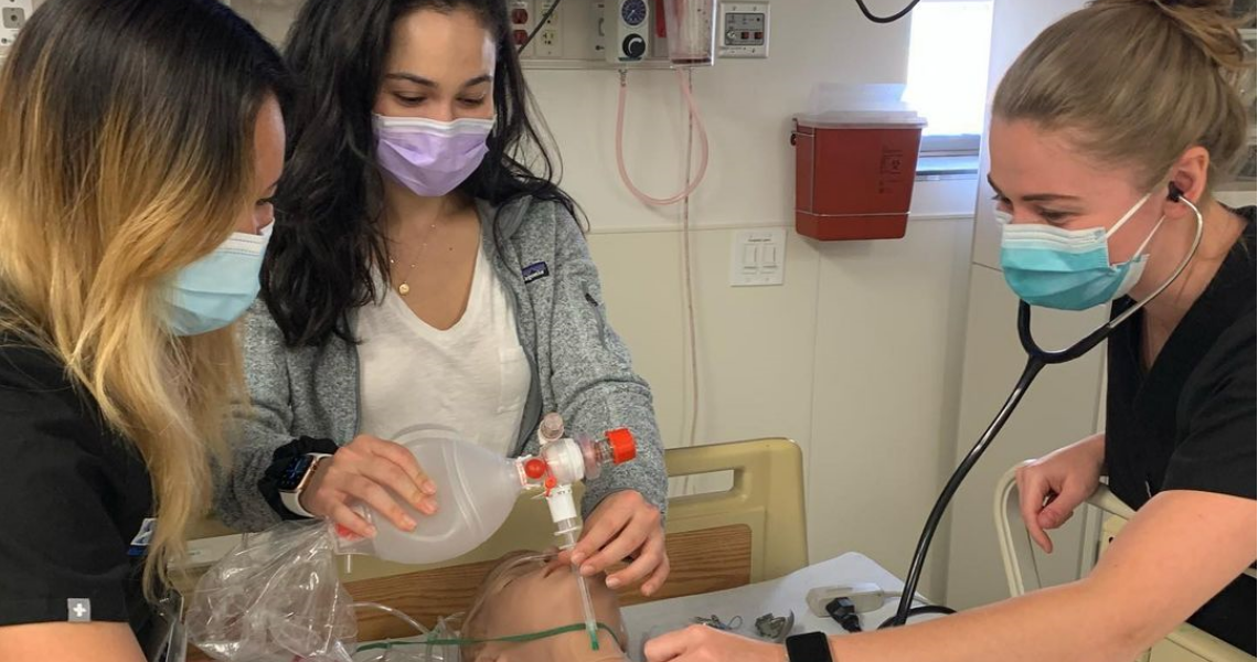 Residents participating in airway sim Residents participating in airway sim