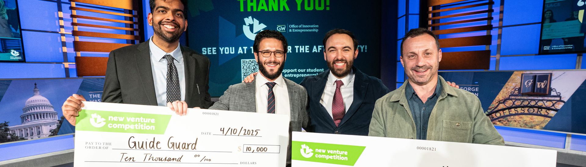 Researchers receiving checks for their research